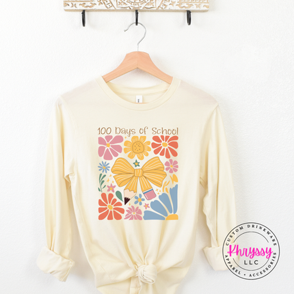 Rich 100 days of school floral bow long sleeve on natural Bella Canvas with warm botanical bow graphic