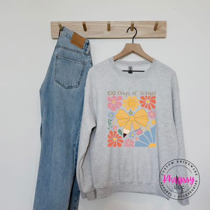 Floral bow 100 days of school crewneck on ash Gildan sweatshirt with warm botanical and golden bow detail