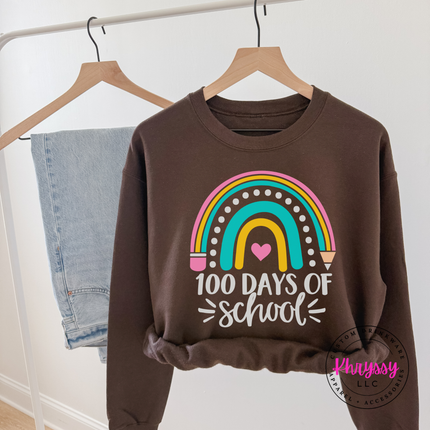 Woman wearing a dark chocolate 100 Days Of School crewneck sweatshirt.