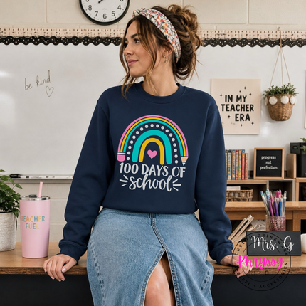 Navy rainbow 100 Days Of School crewneck with pencil accents.
