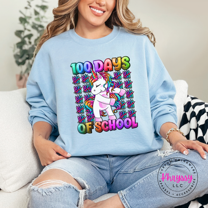 light blue crewneck featuring a colorful unicorn 100 Days Of School design.