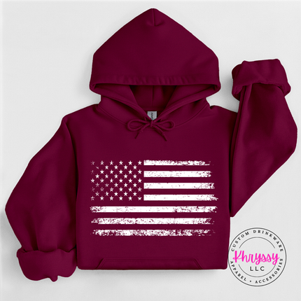 Maroon pullover hoodie showing a distressed white American flag design.
