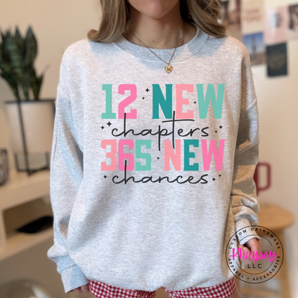 Ash crewneck sweatshirt featuring 12 new chapters 365 new chances lettering.