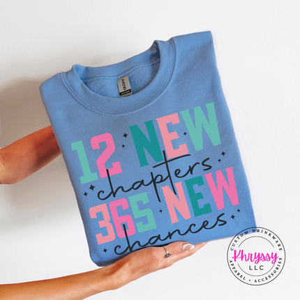 Model wearing the 12 New Chapters New Year crewneck sweatshirt in Carolina Blue.