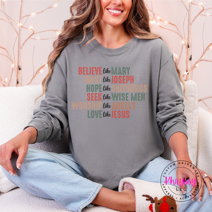 Close up of the Believe Like Mary art on a Gray long sleeve tee.