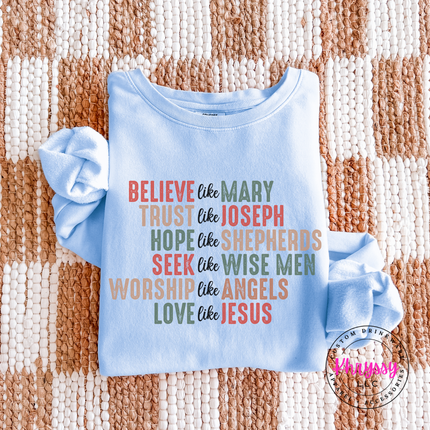Hydrangea long sleeve tee showing six lines of Christian Christmas lettering.