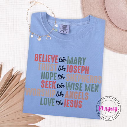 Washed Denim long sleeve tee showing six lines of Christian Christmas lettering.
