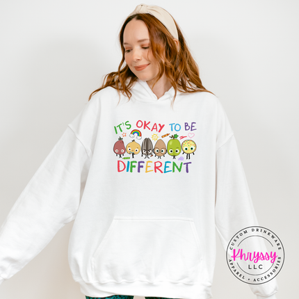 Vibrant inclusion teacher pullover hoodie on white Gildan with colorful crayon characters and rainbow print