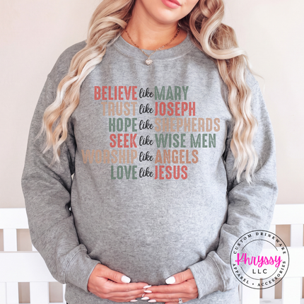 Sport Gray crewneck sweatshirt featuring Believe Like Mary nativity lettering.