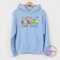 Cheerful colorful classroom inclusion statement hoodie on light blue Gildan with bright character detail