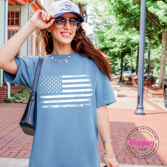 Blue Jean garment-dyed tee featuring a weathered stars-and-stripes flag print in white.