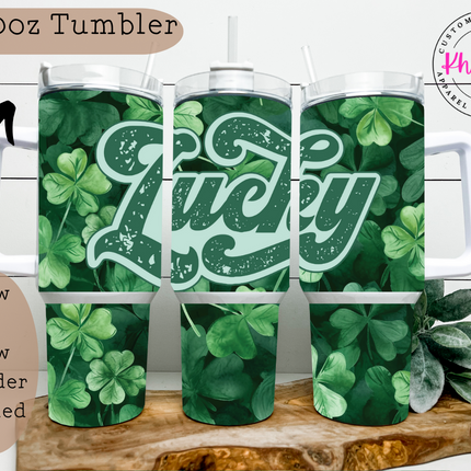 A 40oz stainless steel tumbler with a metal straw, showcasing a bright green color scheme and the word 'Lucky' in bold, white letters, complemented by small shamrocks and clover accents.