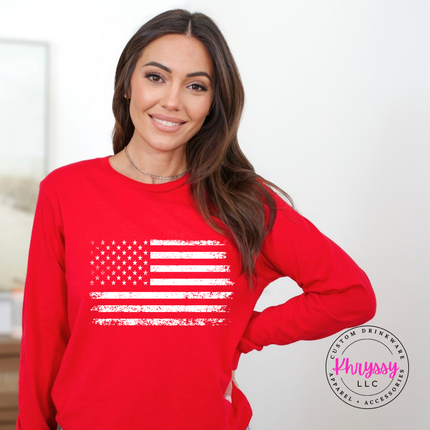 Red long sleeve tee displaying a white distressed patriotic flag print.