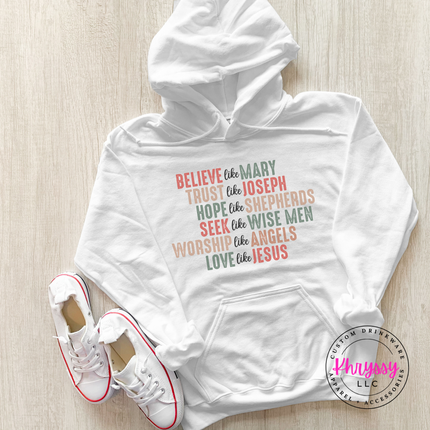 White hoodie showing six lines of Christian Christmas lettering.