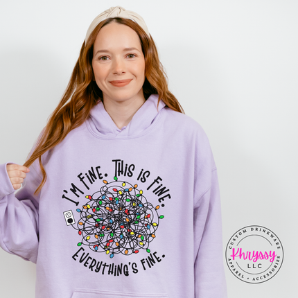 Tangled Christmas lights and Everything's Fine lettering on an Orchid hoodie.