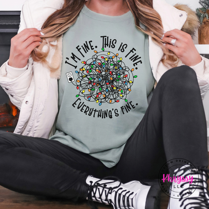 Bay tee with I'm Fine This Is Fine and tangled Christmas lights.