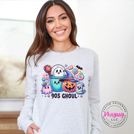 Woman wearing an Ash Bella+Canvas long sleeve with a retro pastel Halloween graphic.