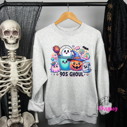 Woman wearing an Ash crewneck sweatshirt with a retro pastel Halloween graphic.
