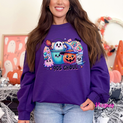 Purple crewneck sweatshirt with the pastel 90s Halloween ghoul crew print