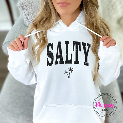 White pullover hoodie displaying a black distressed SALTY beach graphic.