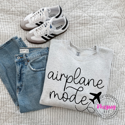 Ash crewneck sweatshirt with a black airplane mode script and airplane graphic.