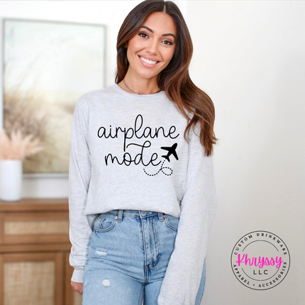 Ash long sleeve tee with a black airplane mode script and airplane graphic.