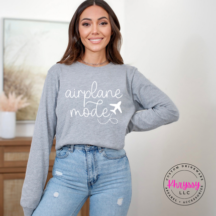 Athletic Heather long sleeve tee featuring a black airplane mode travel script design.