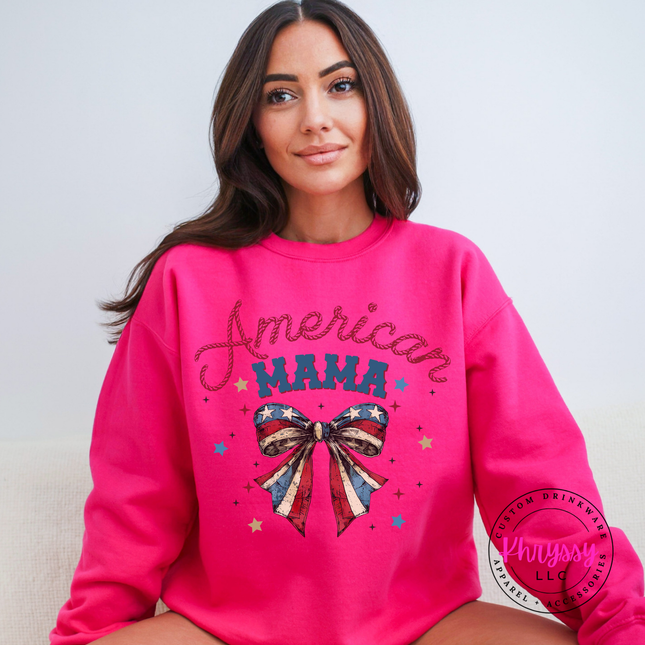 Heliconia crewneck sweatshirt showing a red and navy American Mama flag-bow design.