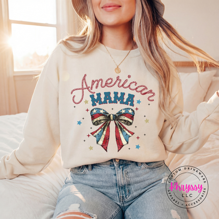 Sand crewneck sweatshirt displaying a vintage patriotic American Mama bow graphic.