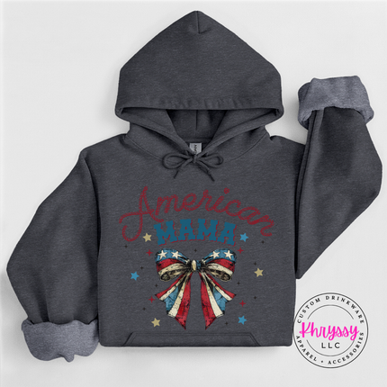 Dark Heather pullover hoodie showing a red and navy American Mama flag-bow design.