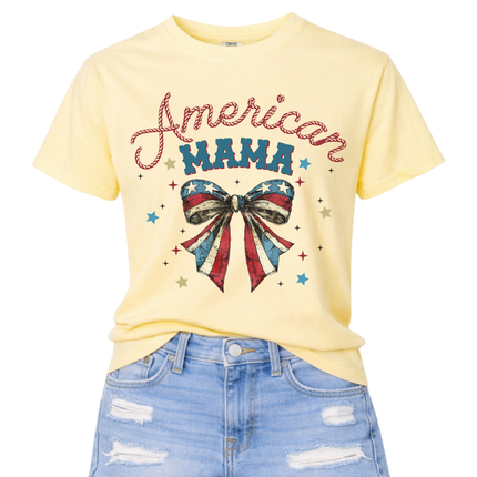 Butter garment-dyed tee featuring a vintage American Mama flag bow and stars.