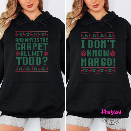 Black hoodie featuring ugly sweater style Todd quote lettering.