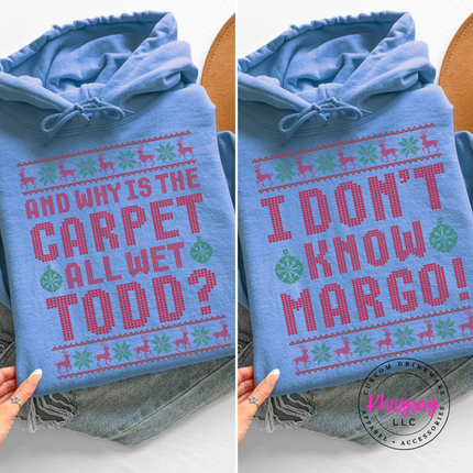 Model wearing the Carpet All Wet Todd hoodie in Carolina Blue.