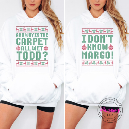 Flat lay of the Carpet All Wet Todd Christmas hoodie in White.