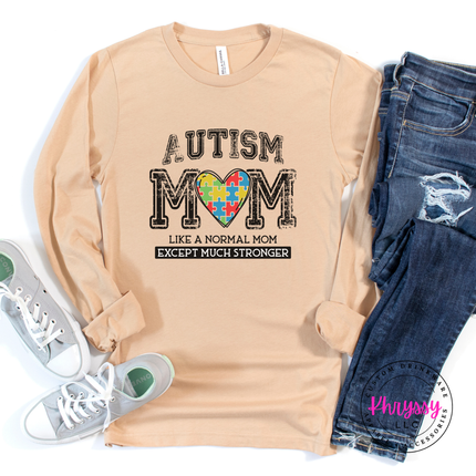 Sand Dune long sleeve tee with an Autism Mom strength quote graphic.