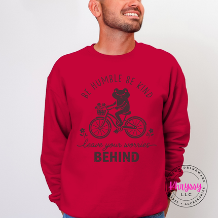 Woman wearing a Red crewneck sweatshirt with the black be humble be kind frog