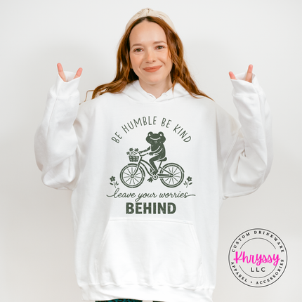 Woman wearing a White hoodie with the black be humble be kind frog
