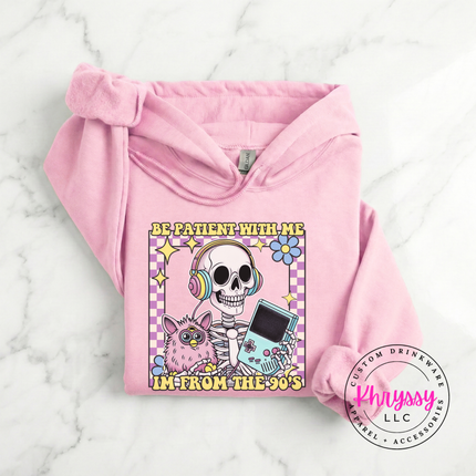 Cozy Gildan 90s humor hoodie with vibrant skeleton headphones design