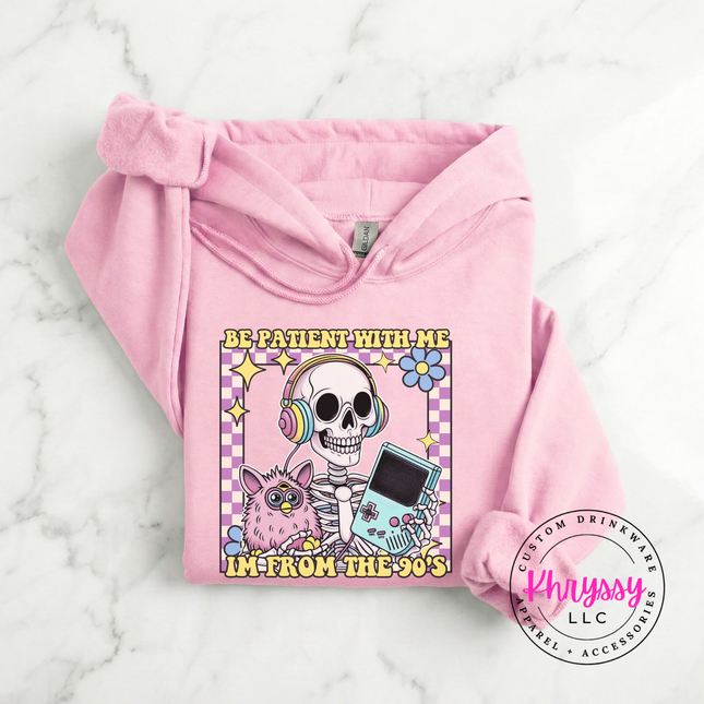 Cozy Gildan 90s humor hoodie with vibrant skeleton headphones design