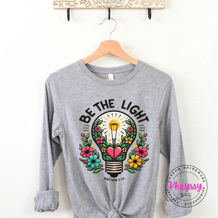 Athletic Heather long sleeve tee with a floral lightbulb Be The Light design