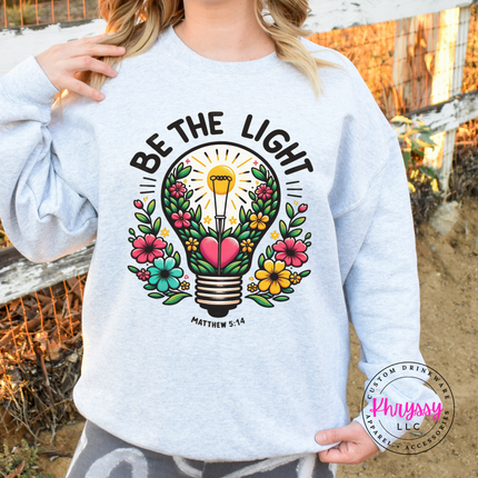 Ash Grey crewneck sweatshirt with a floral lightbulb Be The Light design