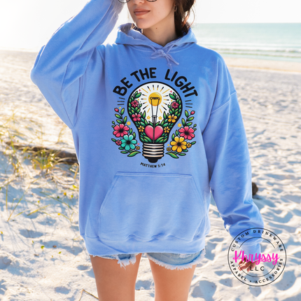 Carolina Blue hoodie featuring a colorful flower-filled lightbulb graphic
