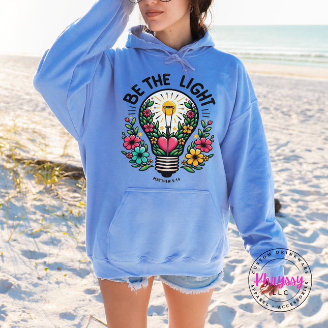 Carolina Blue hoodie featuring a colorful flower-filled lightbulb graphic
