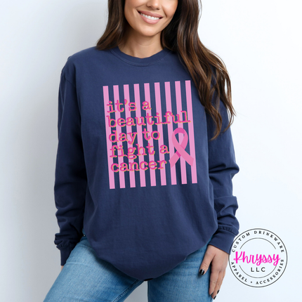 Relaxed fit Navy long sleeve tee displaying the beautiful day to fight cancer ribbon design