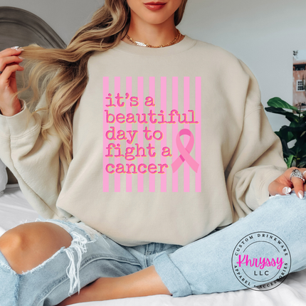 Sand crewneck sweatshirt styled flat with the beautiful day to fight cancer ribbon design