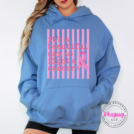 Relaxed fit Carolina Blue hoodie displaying the beautiful day to fight cancer ribbon design
