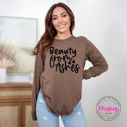Heather brown long sleeve tee featuring a flowing faith redemption design