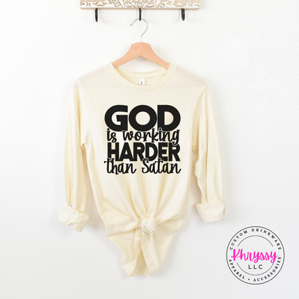 Natural long sleeve tee with a soft black Beauty From Ashes message