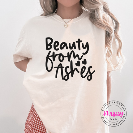 Ivory tee with a Beauty From Ashes message centered on the chest