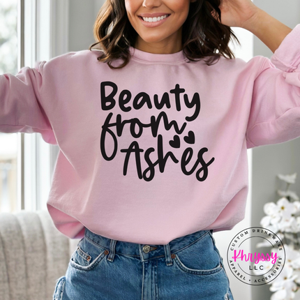 Light Pink crewneck sweatshirt with a soft black Beauty From Ashes message